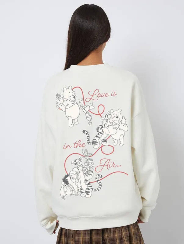 Disney Winnie The Pooh Love Is In The Air Sweatshirt In White sold by Skinnydip London