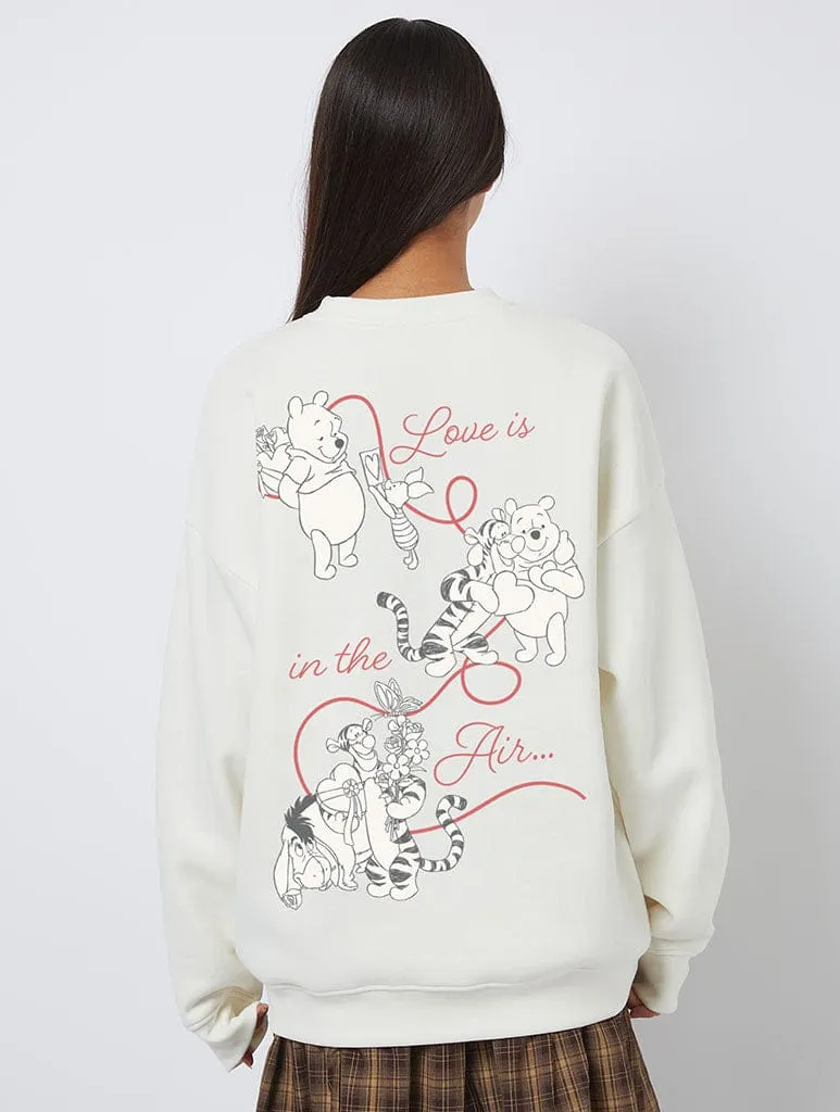 Disney Winnie The Pooh Love Is In The Air Sweatshirt In White sold by Skinnydip London