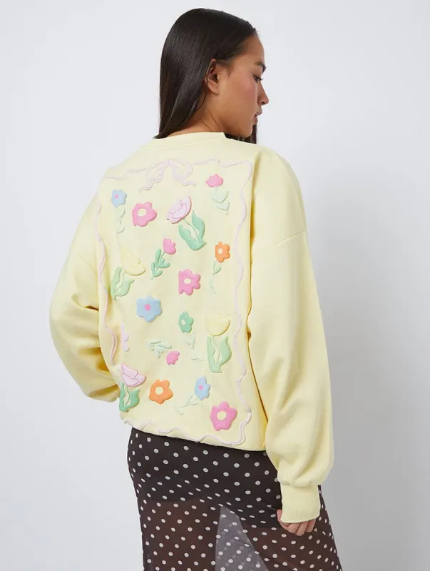 Flora Sweatshirt in Yellow sold by Skinnydip London