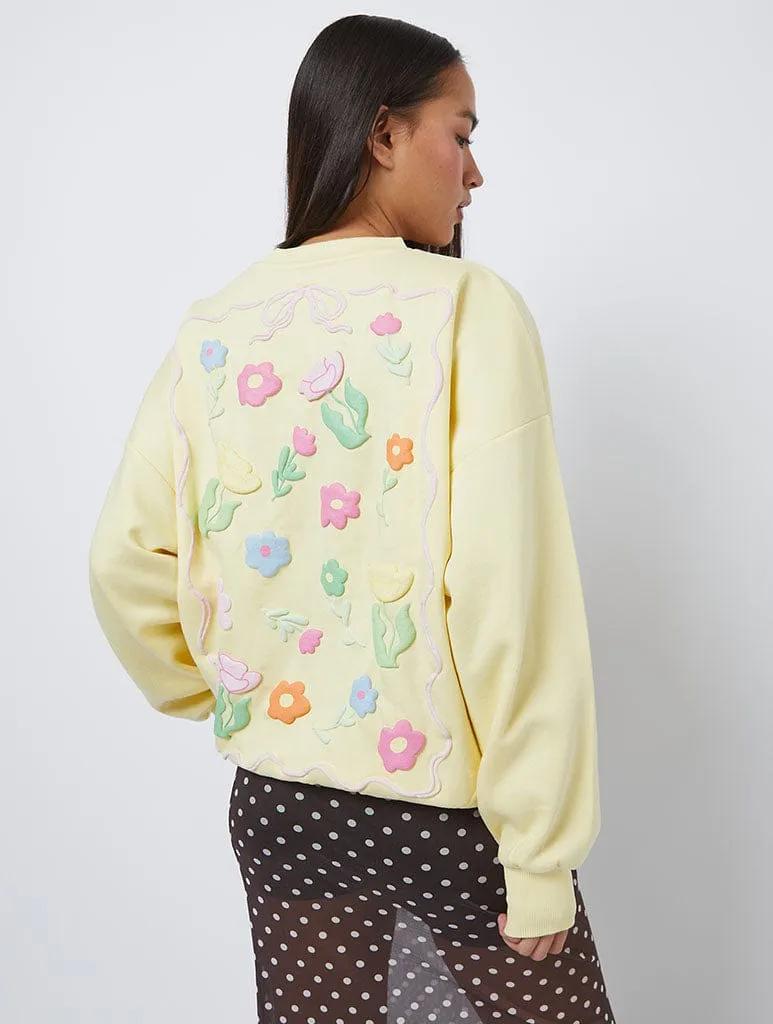Flora Sweatshirt in Yellow sold by Skinnydip London