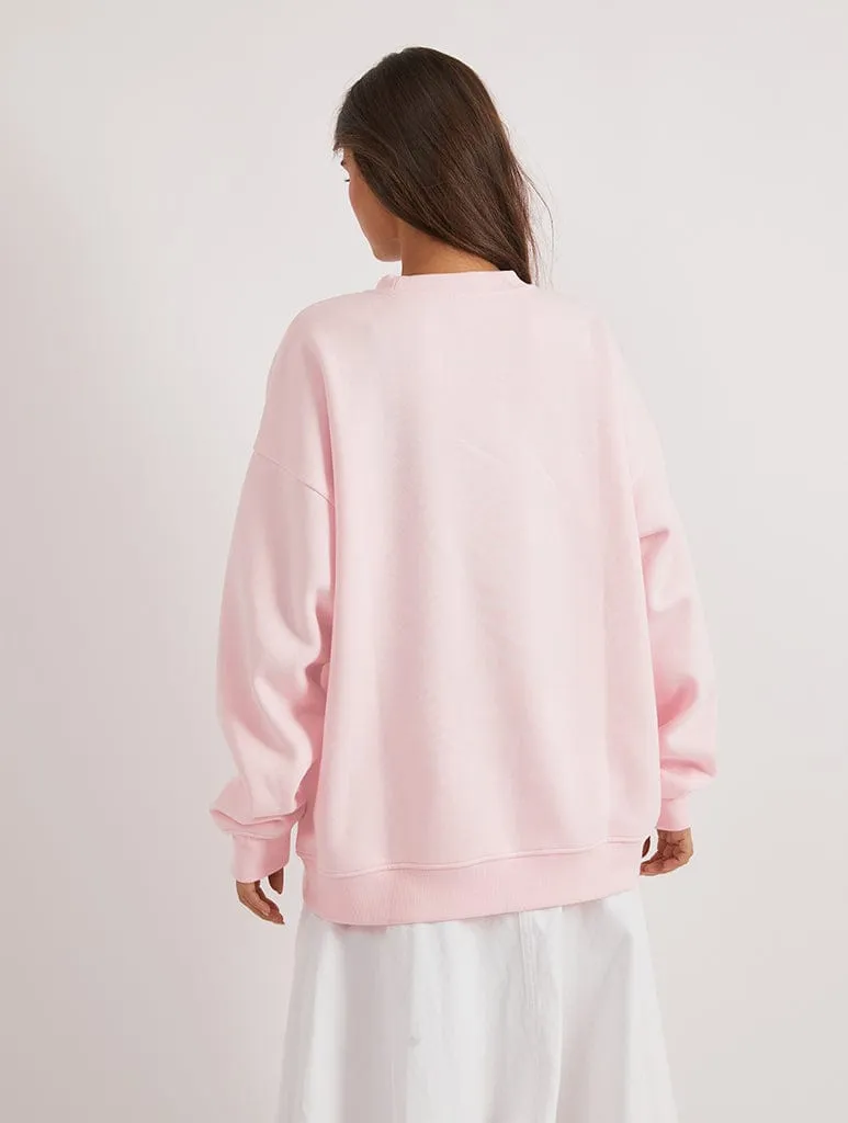 Care Bears x Skinnydip Funshine Bear Easter Egg Sweatshirt In Pink sold by Skinnydip London product image thumbnail 2