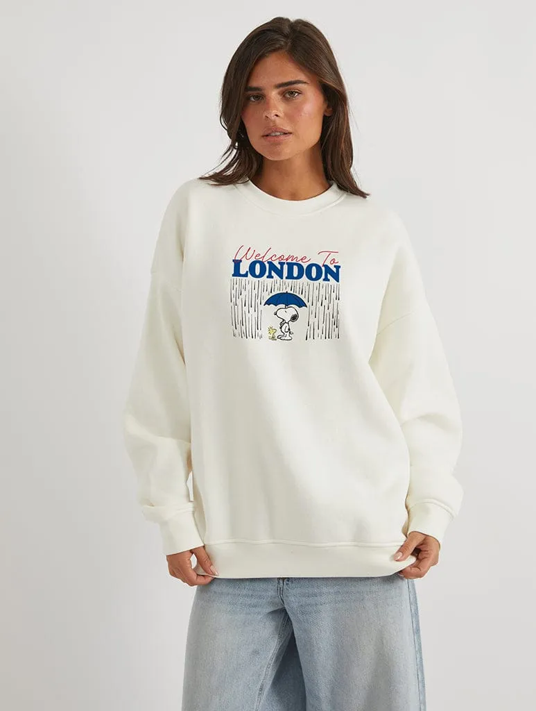 Peanuts x Skinnydip Snoopy Welcome To London Sweatshirt In White sold by Skinnydip London