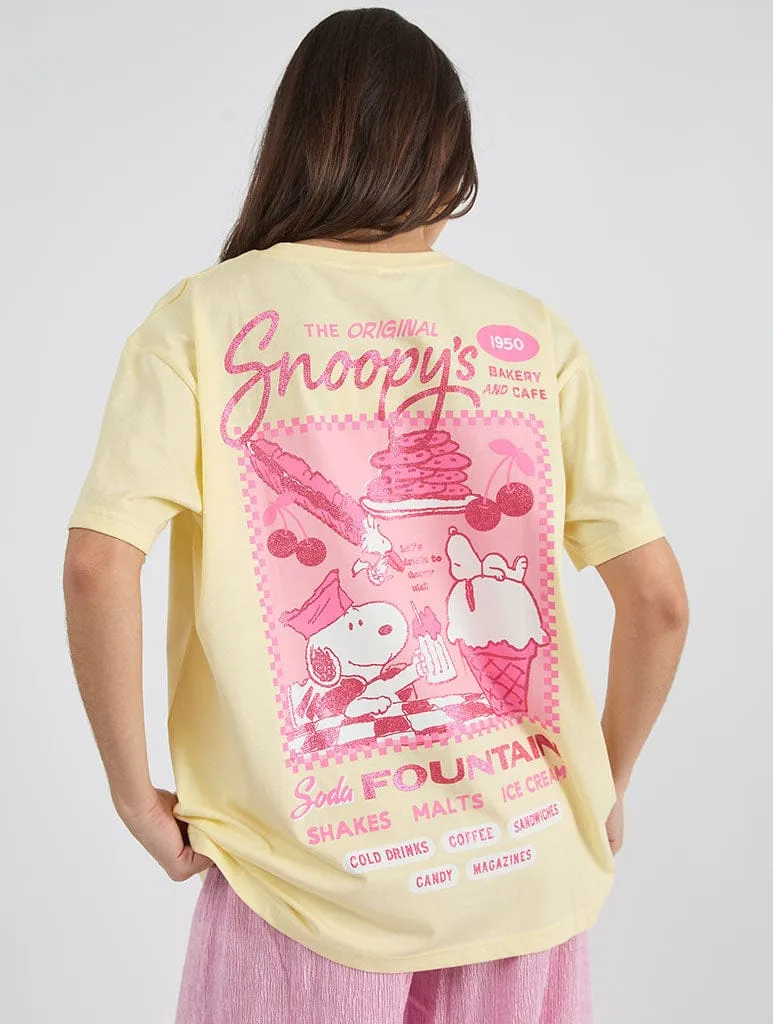 Peanuts x Skinnydip Snoopy Cafe Poster T-Shirt sold by Skinnydip London