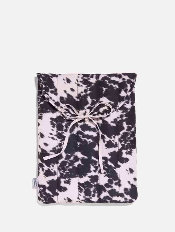 Cow Print Quilted Bow Laptop Sleeve made by Skinnydip London