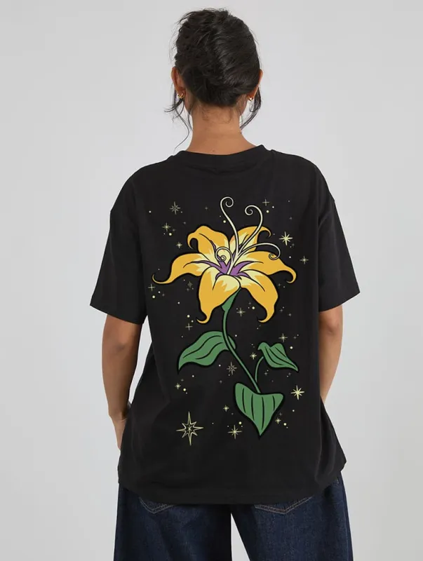 Disney Tangled Glowing Flower T-Shirt In Black made by Skinnydip London