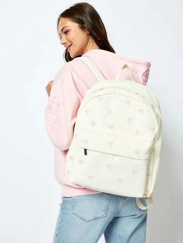 Bow Embroidered Backpack in Cream sold by Skinnydip London