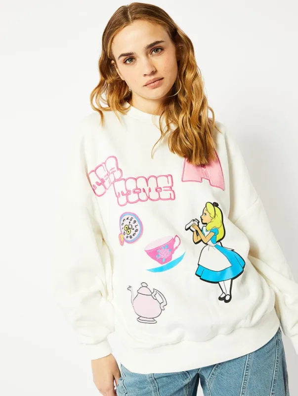 Disney Alice In Wonderland Tea Time Ecru Varsity Sweatshirt sold by Skinnydip London