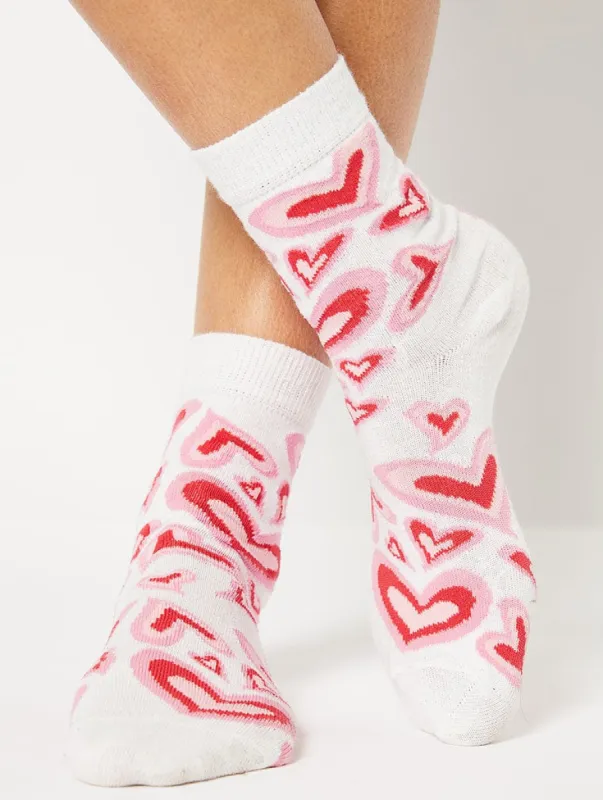 Pink Warped Heart Socks sold by Skinnydip London