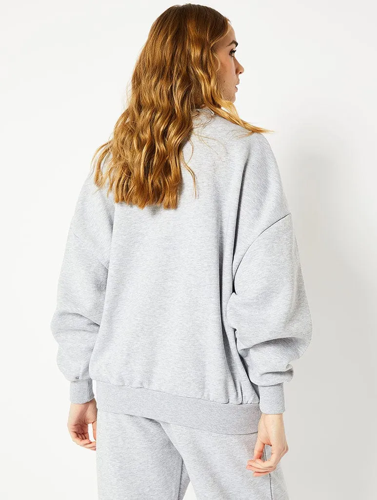 Money Cant Buy Happiness Oversized Sweatshirt in Grey sold by Skinnydip London product image thumbnail 3