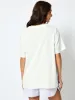 Mallows Beauty x Skinnydip Bow T-Shirt In Ecru sold by Skinnydip London