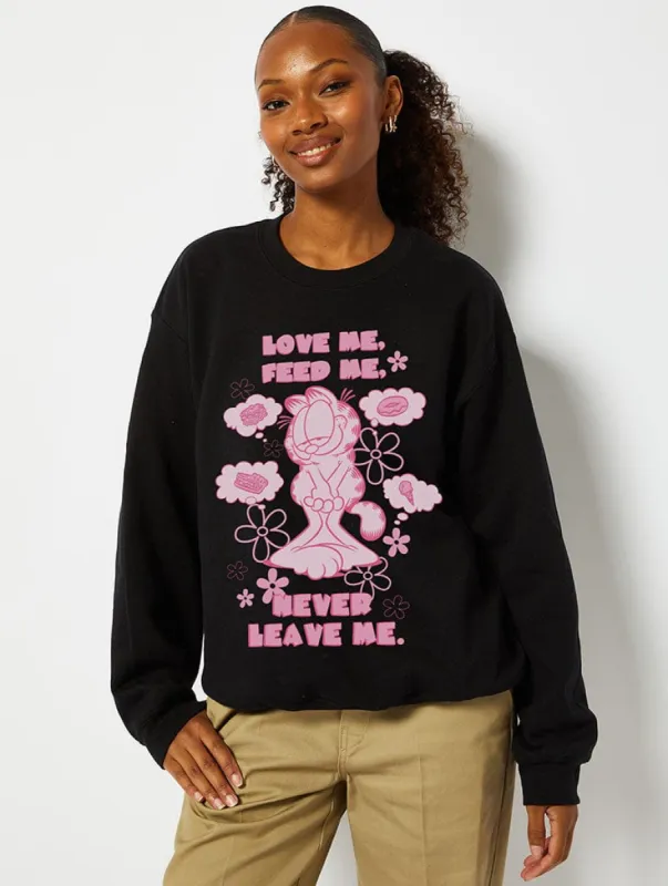 Garfield x Skinnydip Love Me, Feed Me, Never Leave Me Sweatshirt in Black sold by Skinnydip London