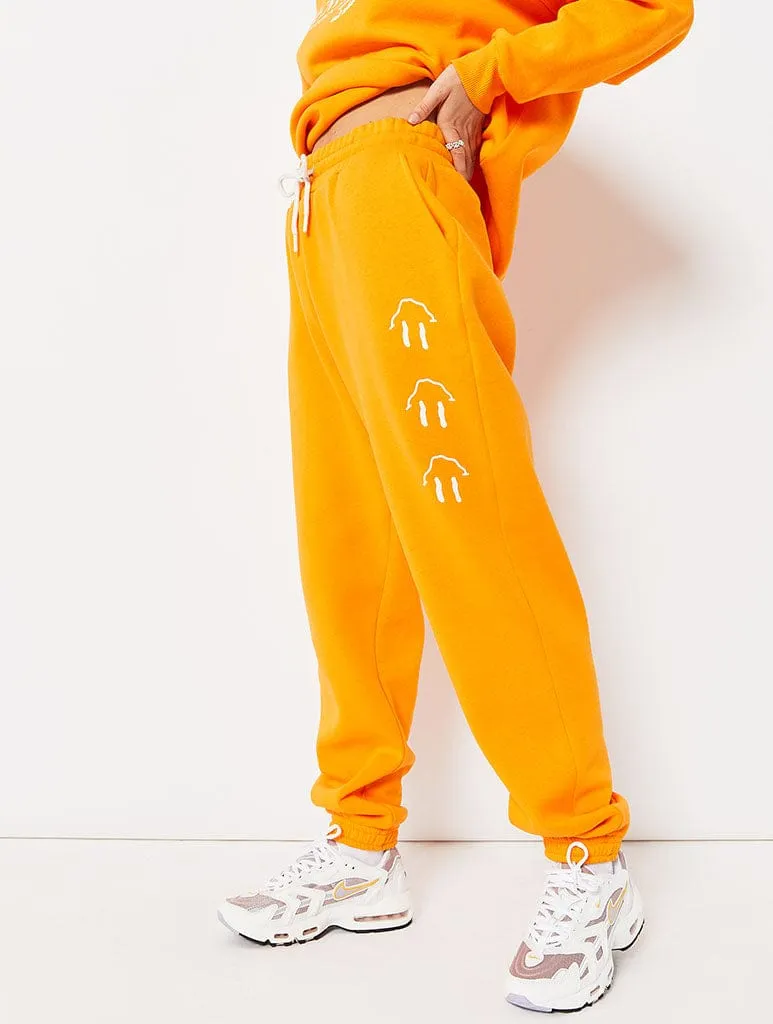 Emotional When Hungry Orange Joggers Co-ord sold by Skinnydip London