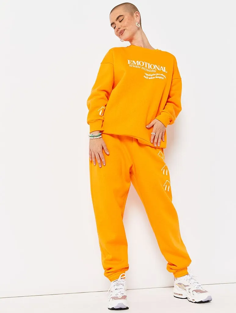 Emotional When Hungry Orange Joggers Co-ord sold by Skinnydip London product image thumbnail 2
