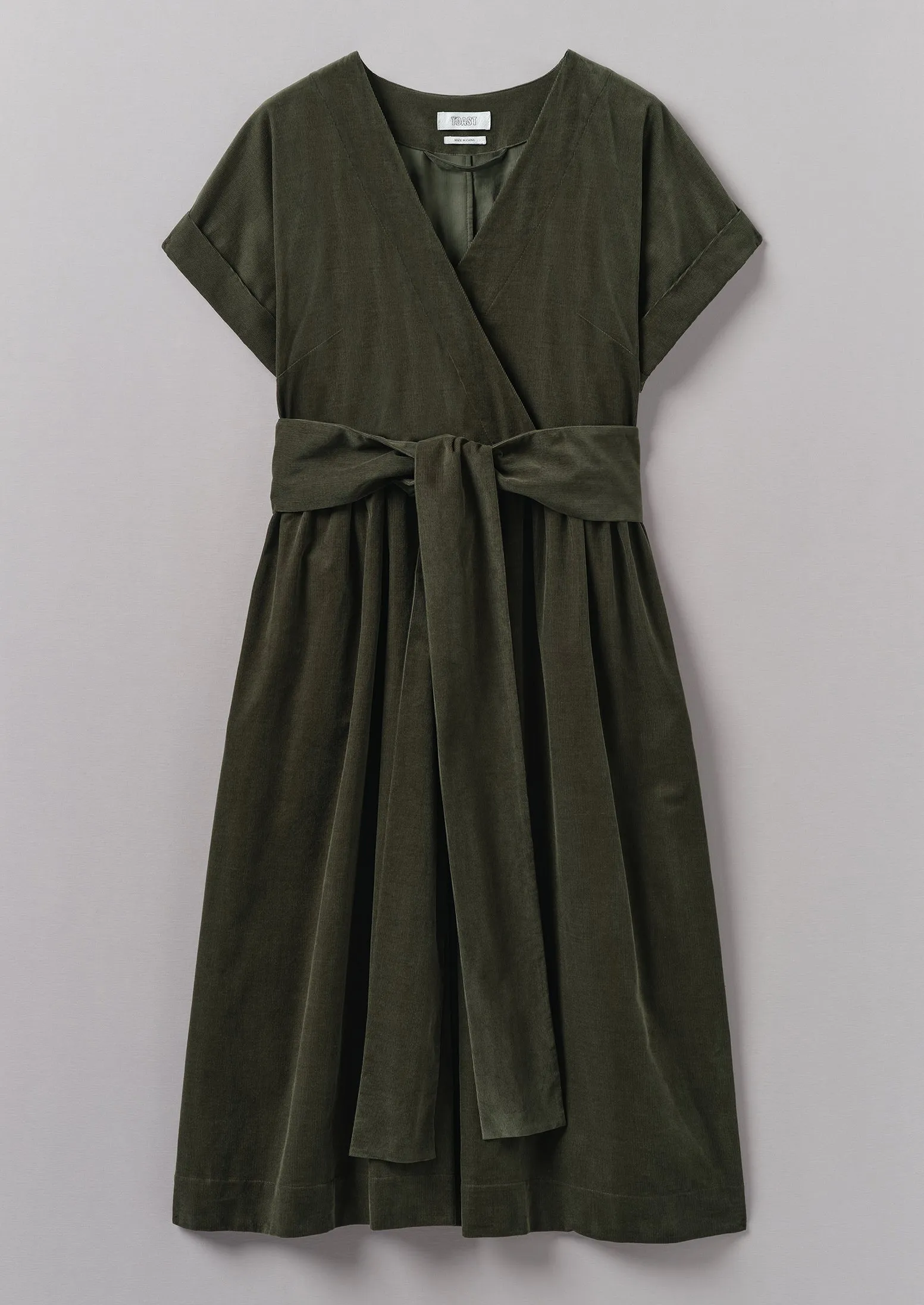 Needlecord Wrap Front Dress | Seaweed sold by TOAST