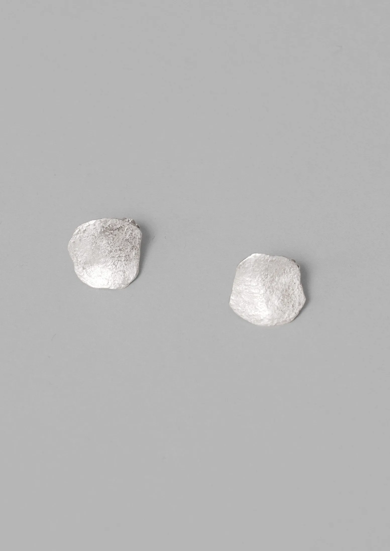 Emily Nixon Flat Rock Stud Earrings | Silver sold by TOAST