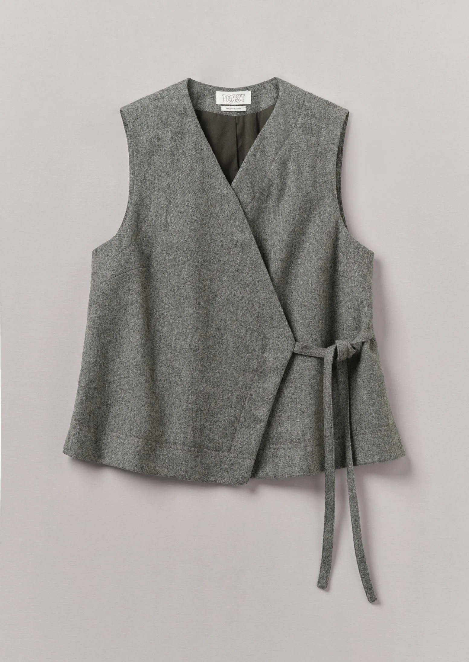 Wool Flannel Sleeveless Jacket | Grey Melange sold by TOAST