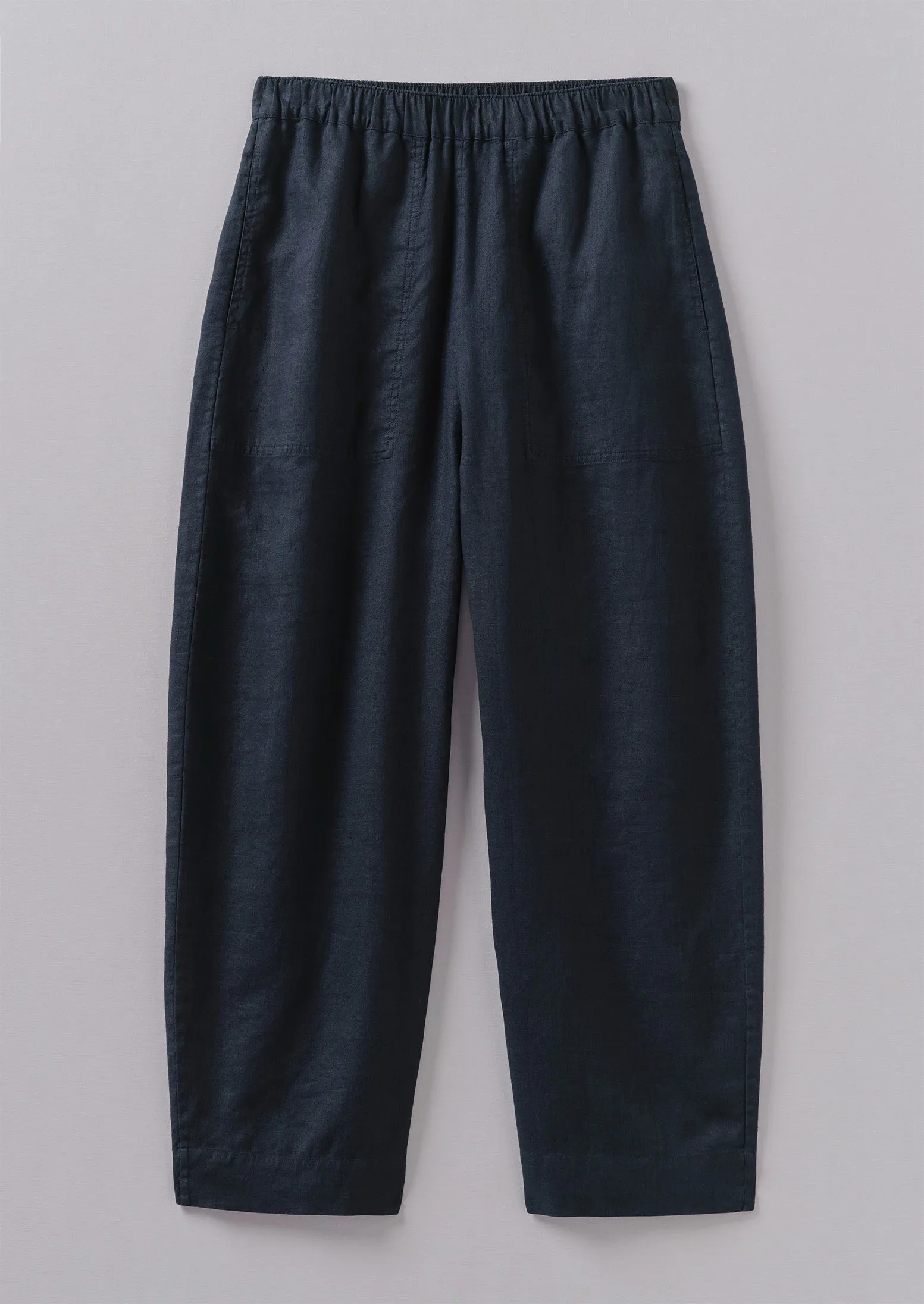 Garment Dyed Linen Barrel Leg Trousers | Midnight sold by TOAST