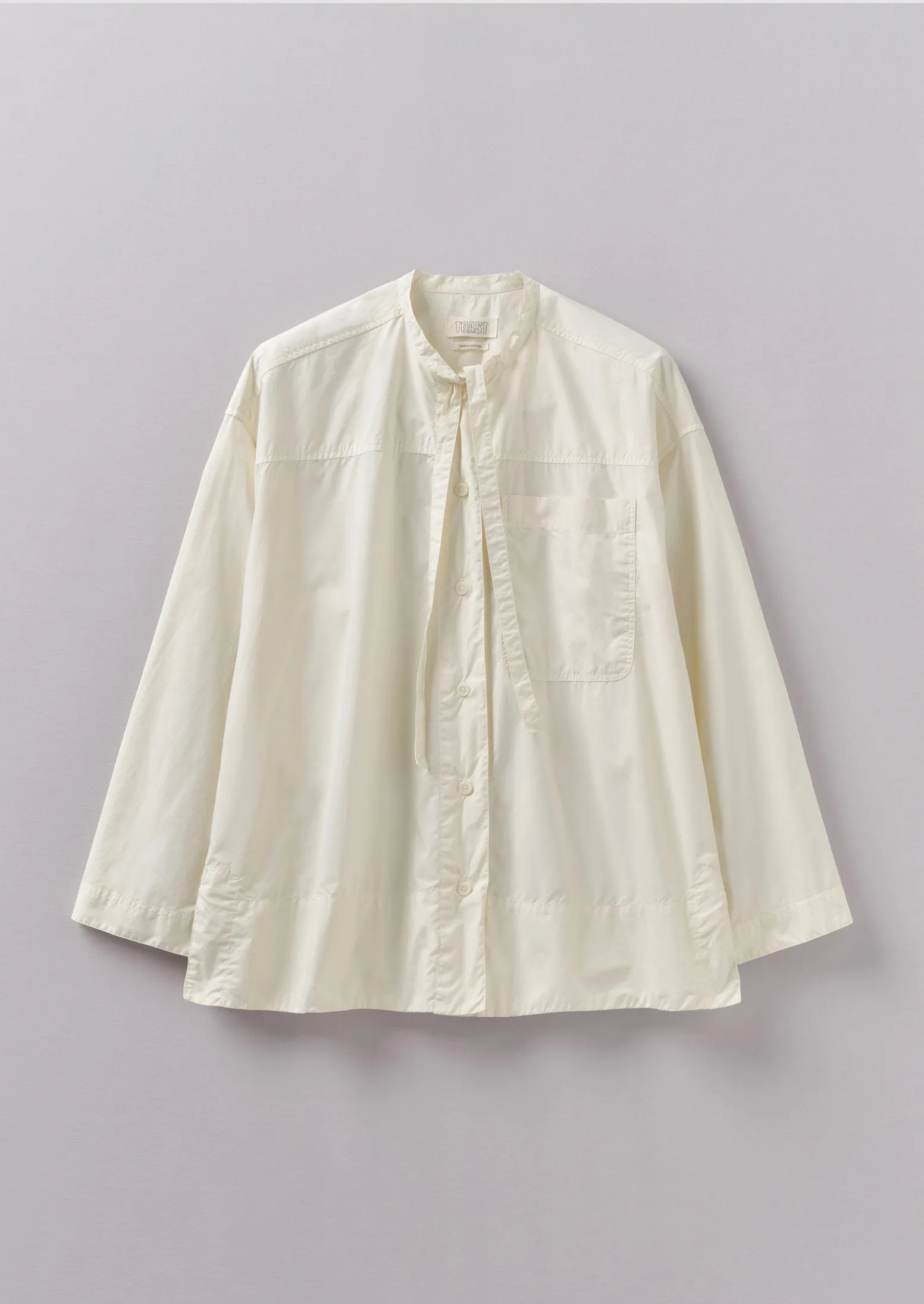Tie Neck Cotton Poplin Shirt | Ecru sold by TOAST