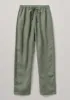 Panelled Garment Dyed Linen Trousers | Sage sold by TOAST