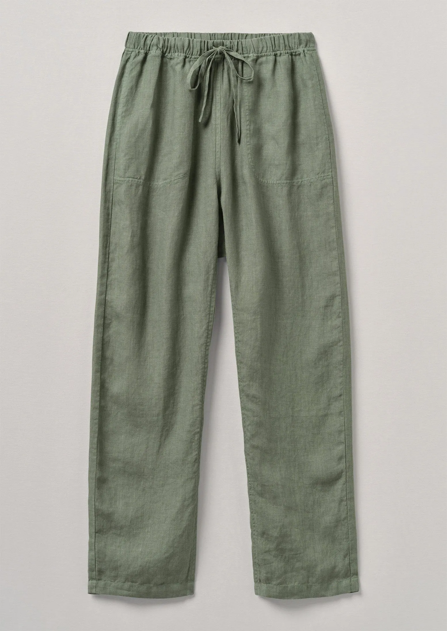 Panelled Garment Dyed Linen Trousers | Sage sold by TOAST
