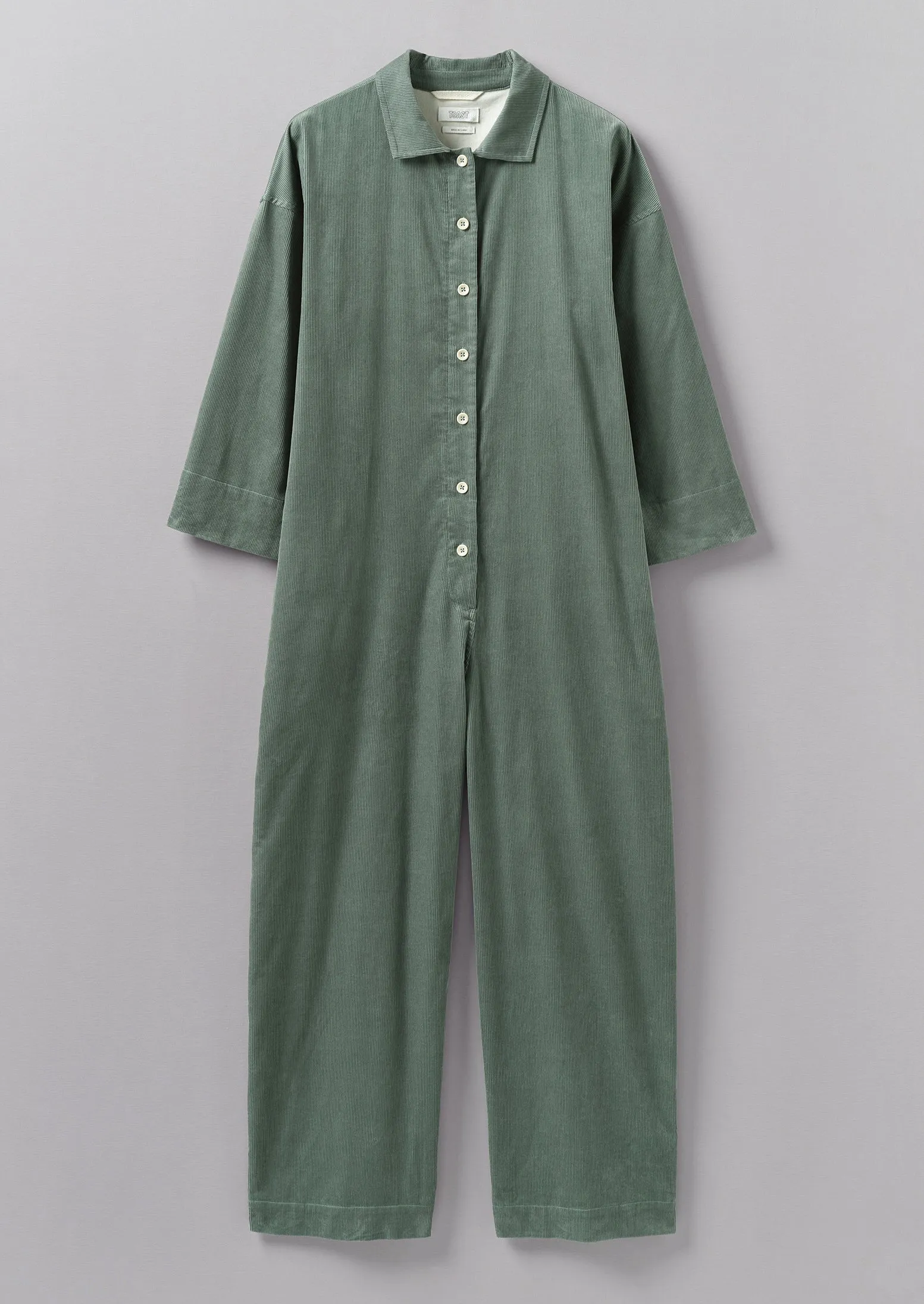 Wide Leg Organic Cord Jumpsuit | Sage sold by TOAST