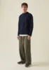 British Wool Cable Knit Sweater | Navy sold by TOAST