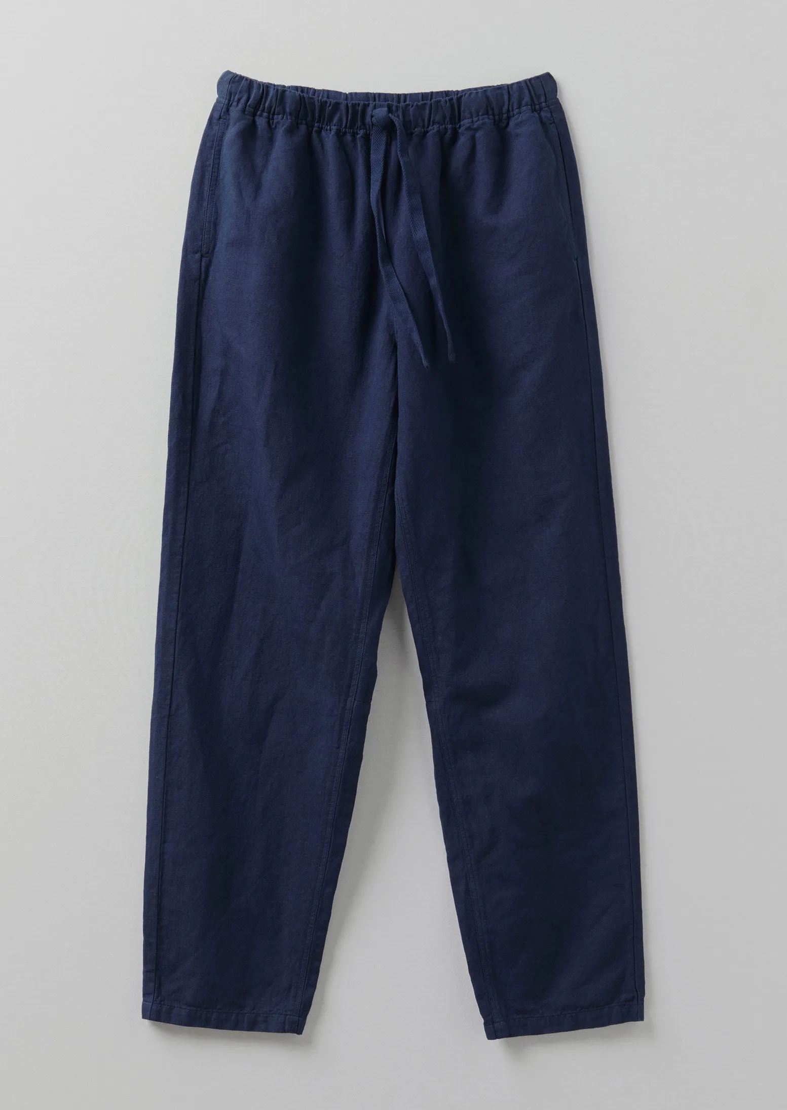 Alfie Garment Dyed Herringbone Trousers | Dark Indigo sold by TOAST