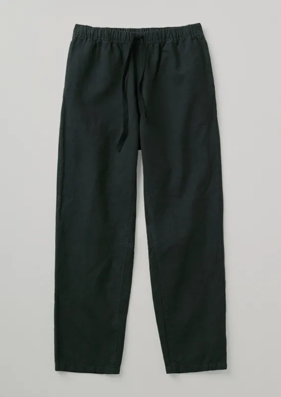 Garment Dyed Herringbone Trousers | Washed Black sold by TOAST