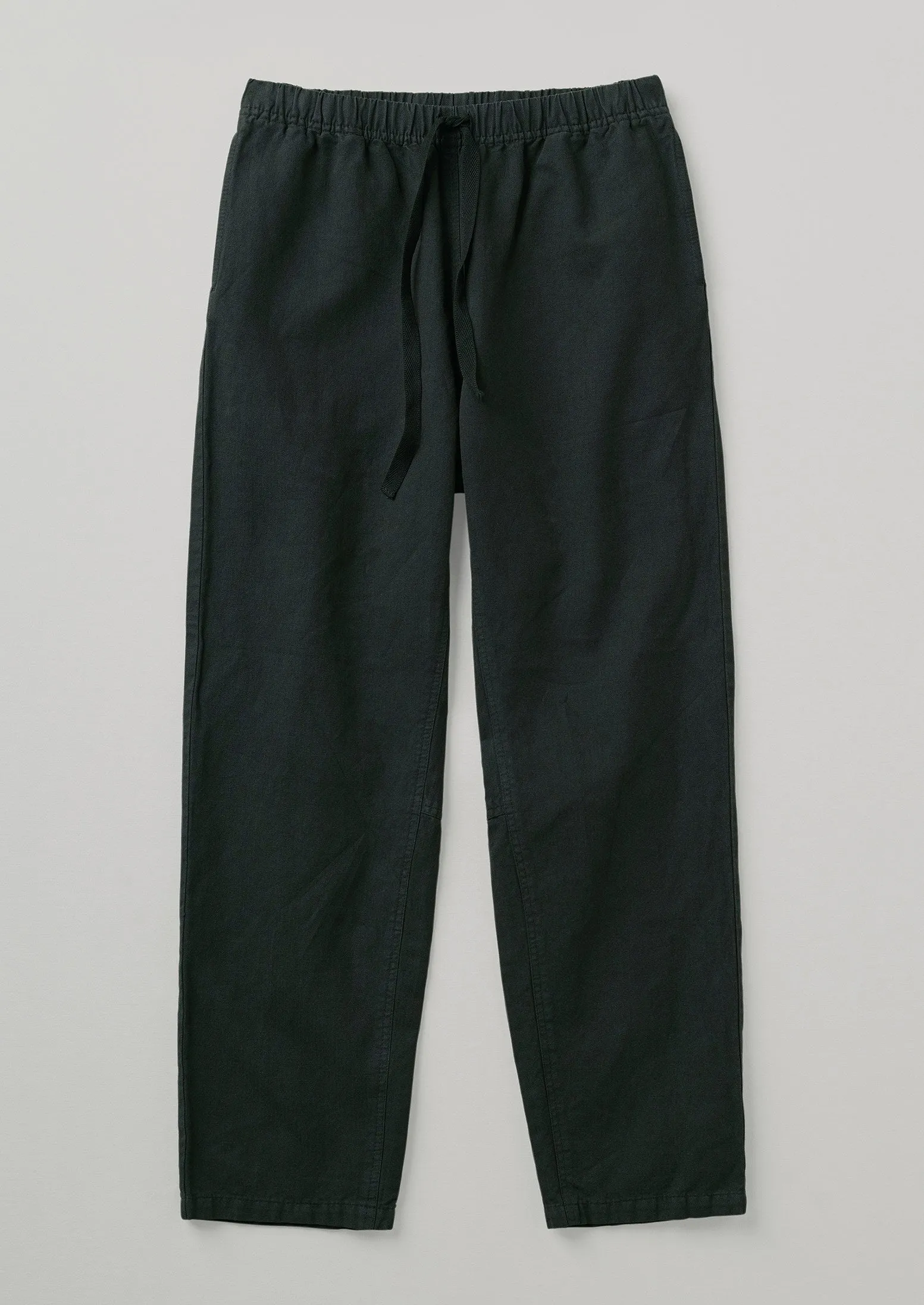 Garment Dyed Herringbone Trousers | Washed Black sold by TOAST