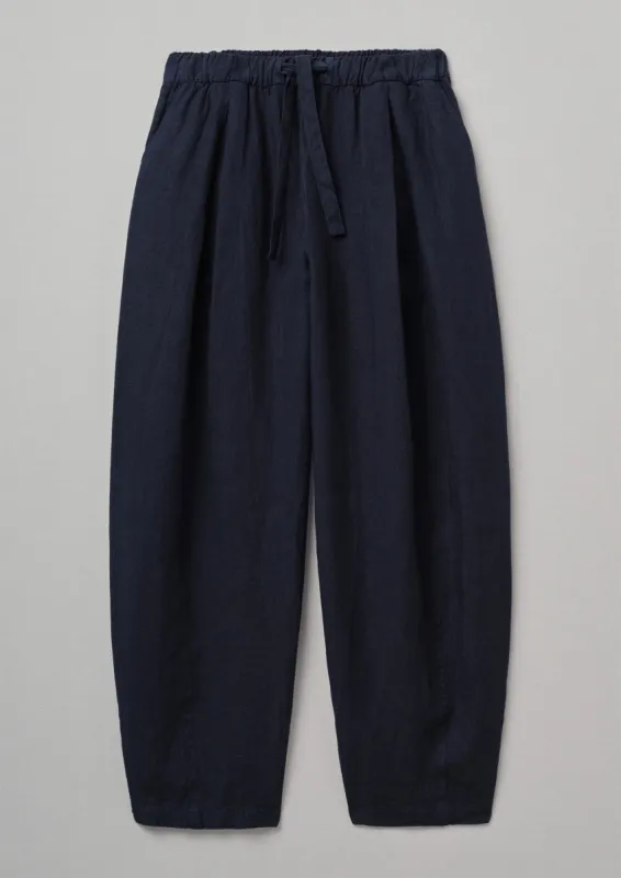 Garment Dyed Linen Balloon Trousers | Midnight sold by TOAST