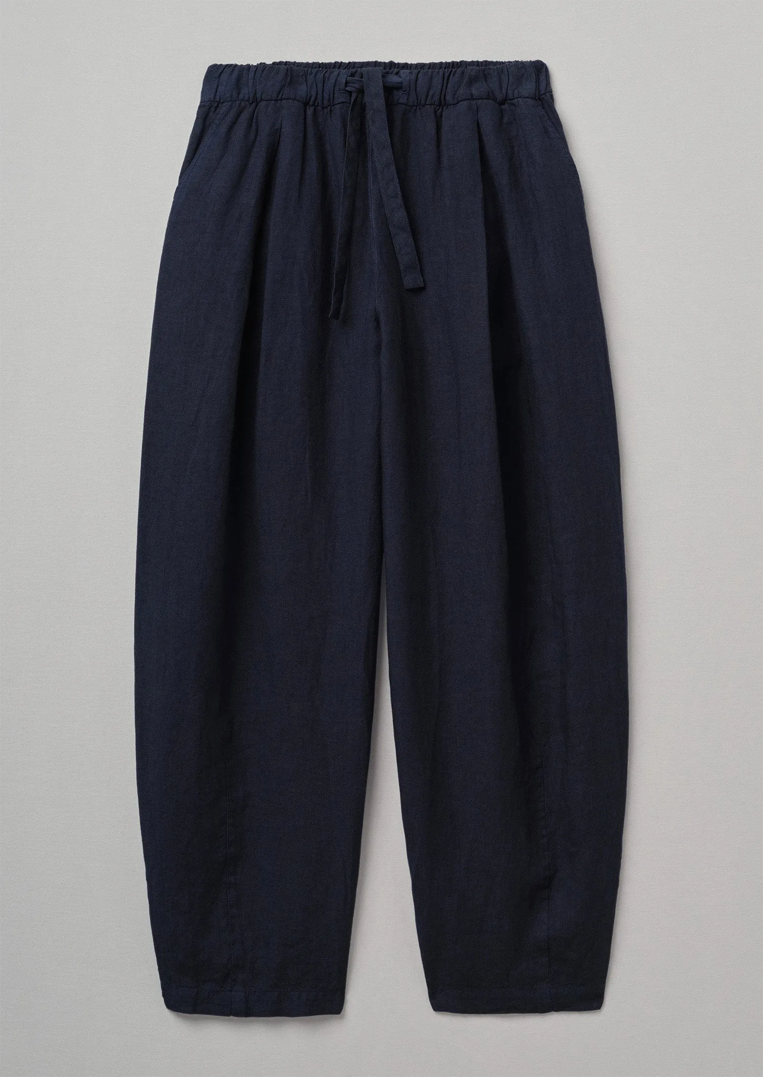 Garment Dyed Linen Balloon Trousers | Midnight sold by TOAST