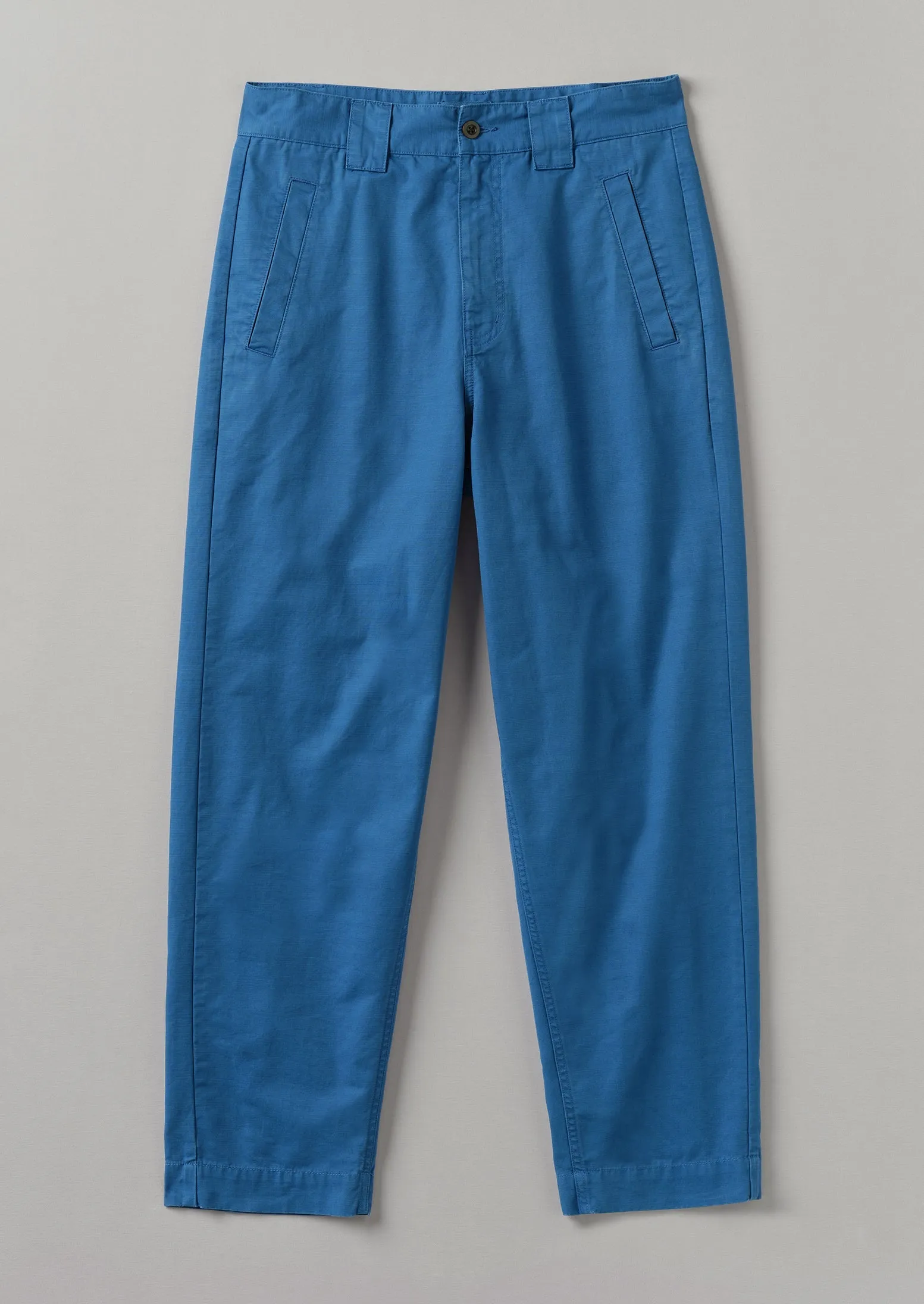 Garment Dyed Organic Cotton Tapered Trousers | Flask Blue sold by TOAST