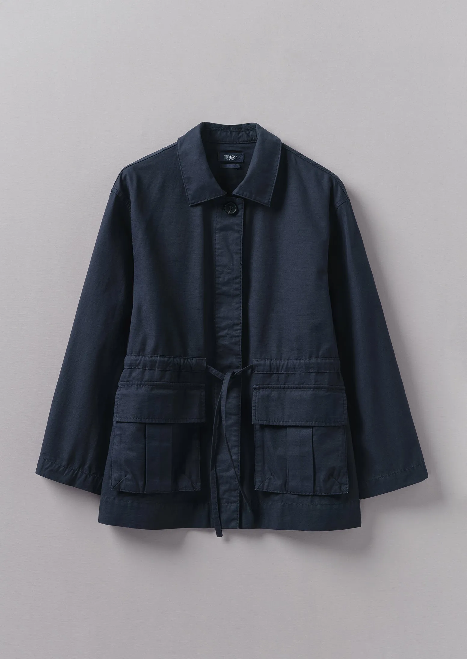 Compact Organic Cotton Utility Jacket | Liquorice Navy sold by TOAST
