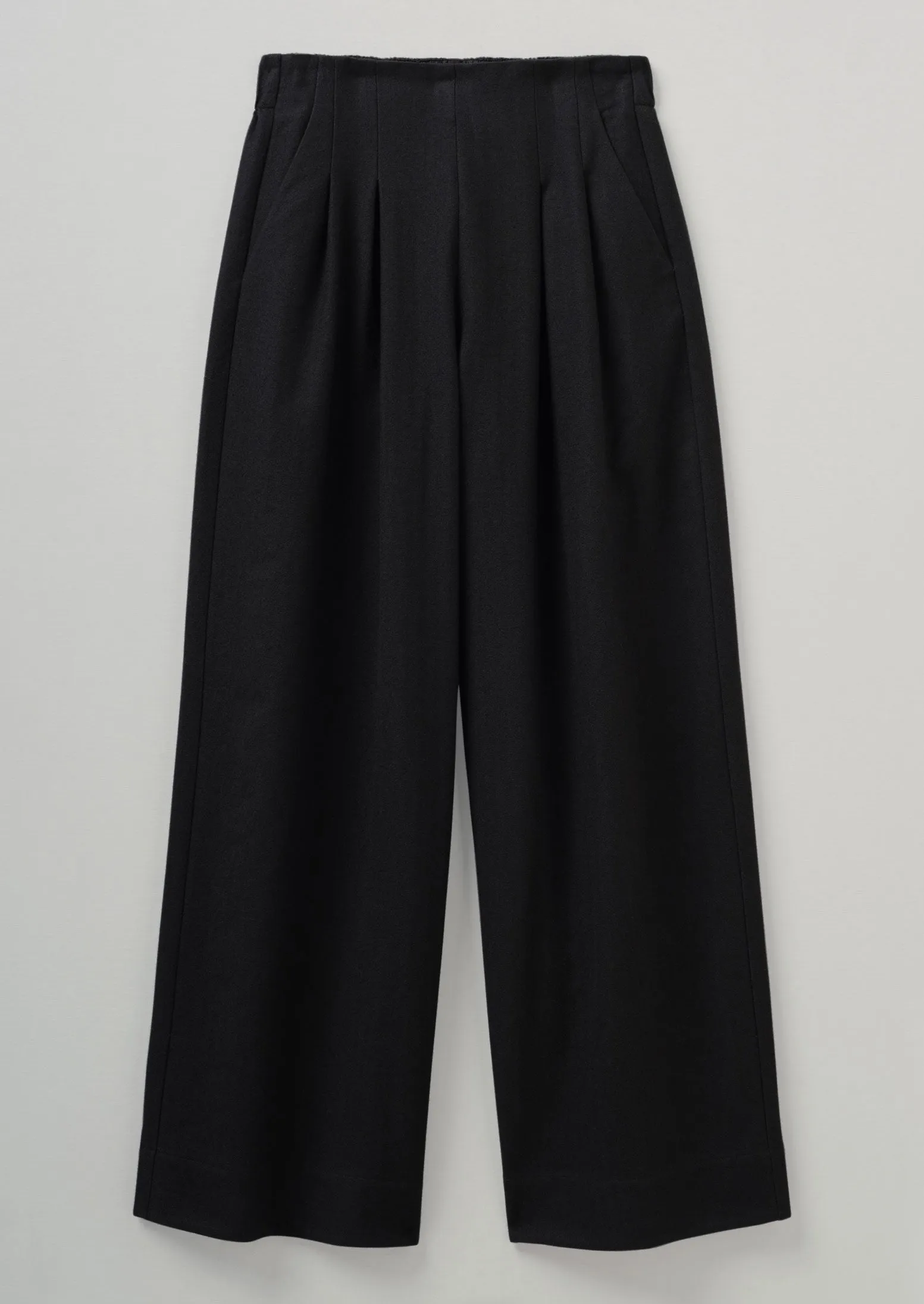 Corinne Wool Cotton Herringbone Wide Leg Trousers | Black sold by TOAST