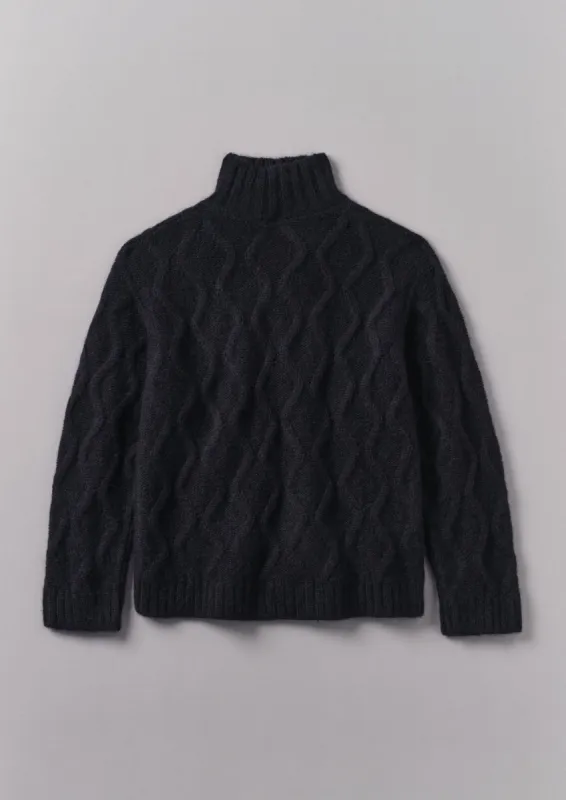 Roll Neck Cable Knit Sweater | Navy sold by TOAST