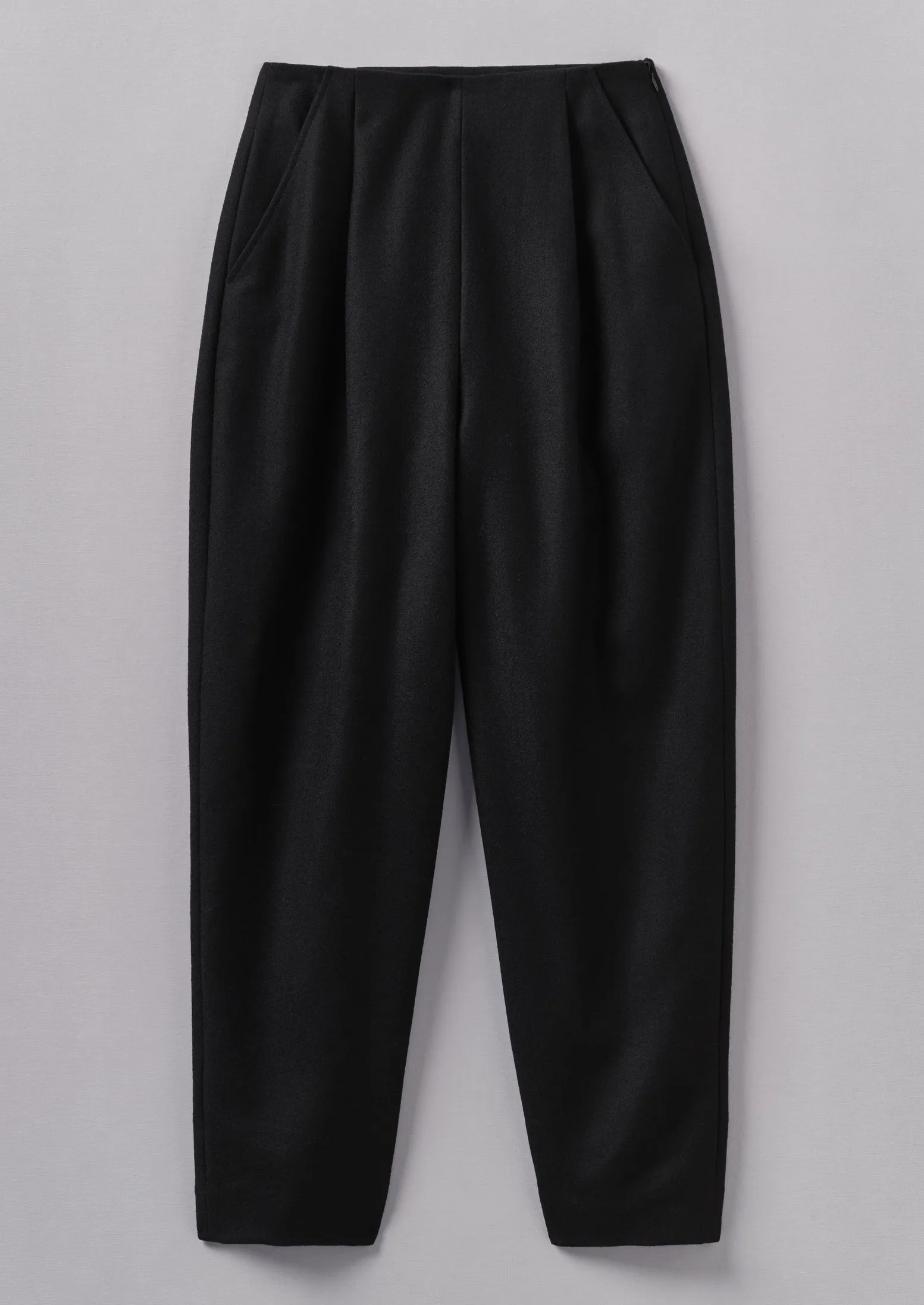 Wool Flannel Pleat Front Trousers | Black sold by TOAST