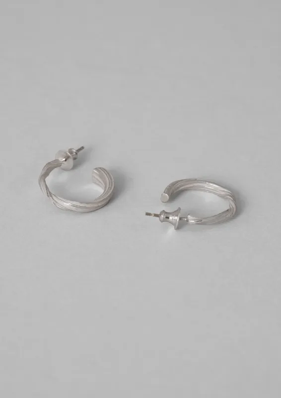 Emily Nixon Mitsuro Medium Ripple Hoops | Silver sold by TOAST