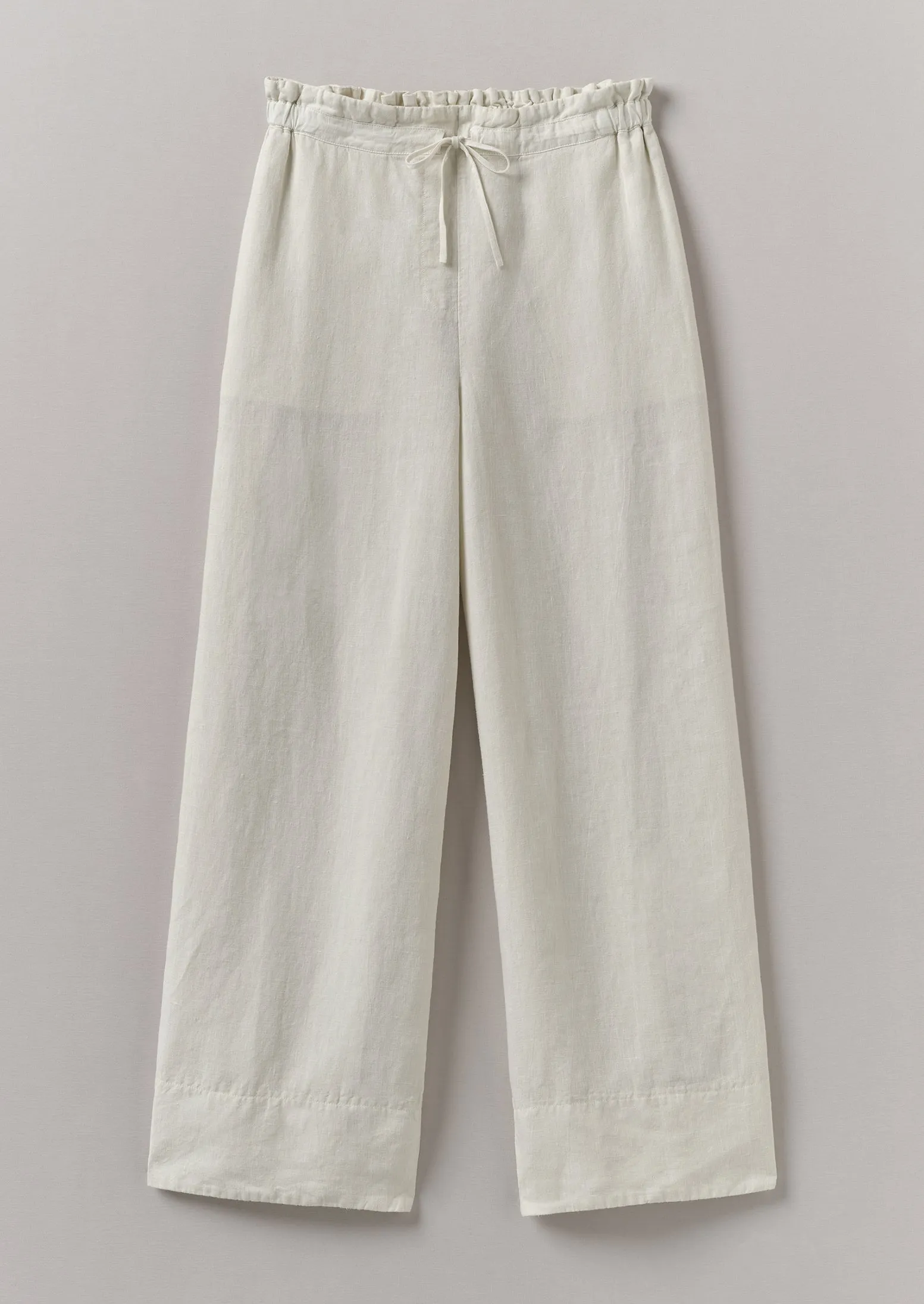 Garment Dyed Linen Wide Leg Trousers | Oat sold by TOAST