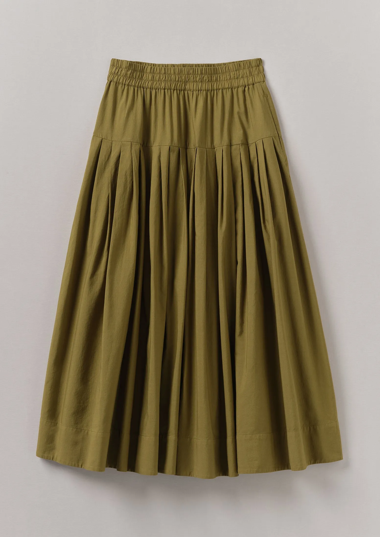 Pleated Raised Stripe Cotton Skirt | Warm Olive sold by TOAST