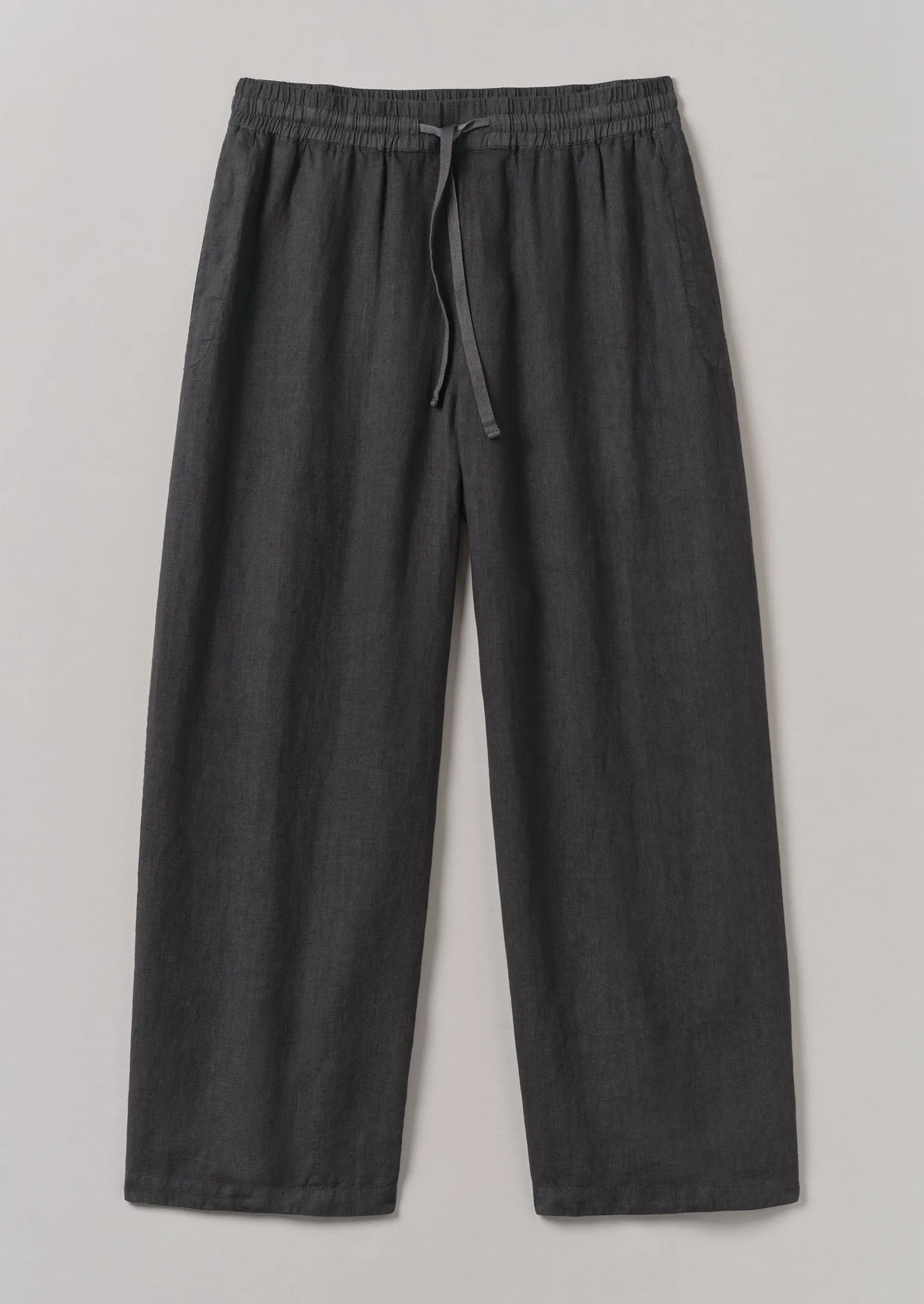 Garment Dyed Linen Drawstring Trousers | Black Pepper sold by TOAST