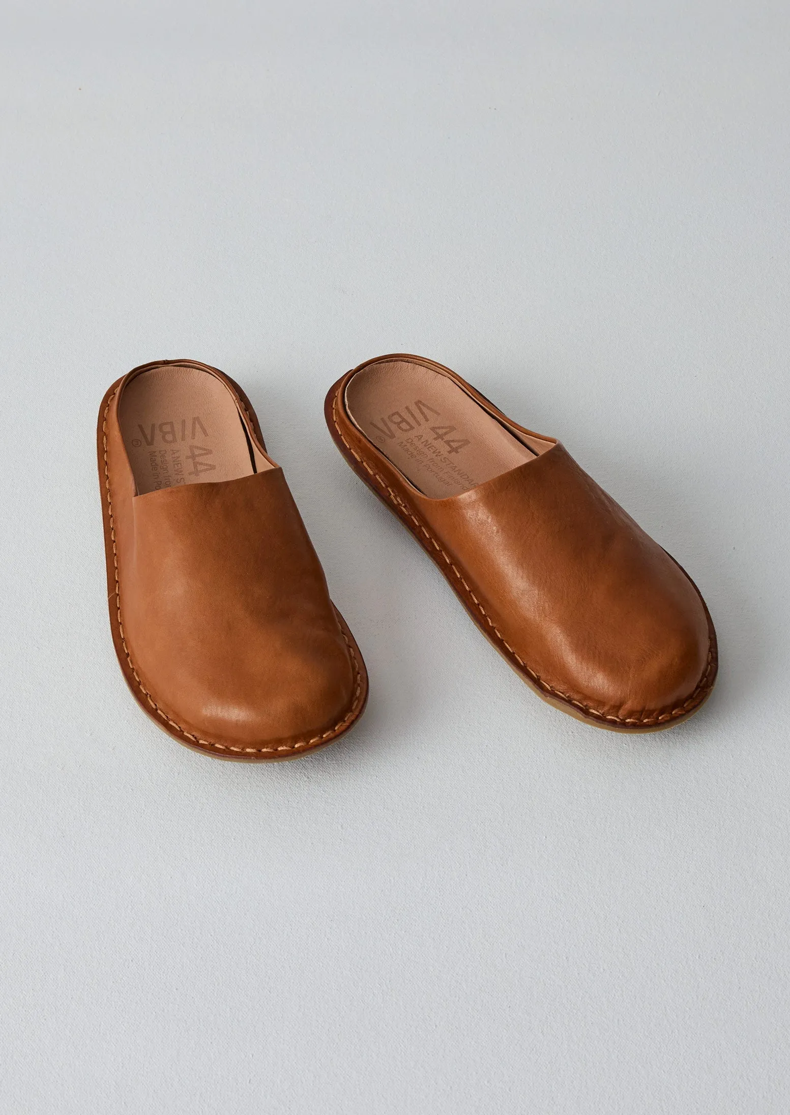 Vibae Mules | Tan sold by TOAST