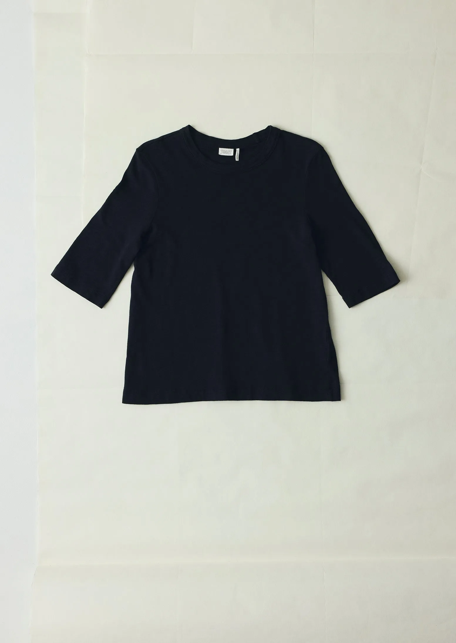 Cleo Cotton Tee | Carbon Black sold by TOAST