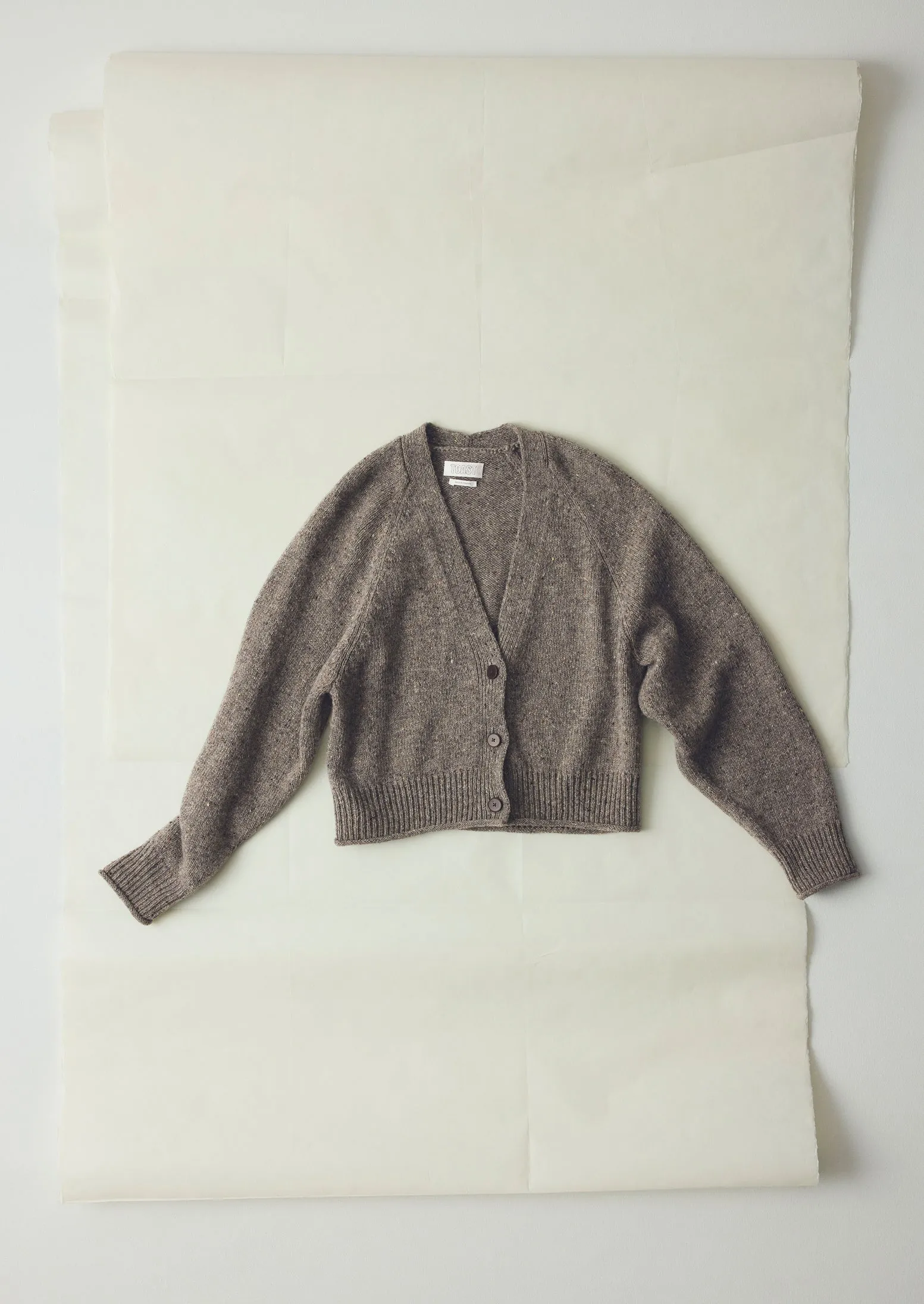 Donegal Wool V Neck Cardigan | Smoke sold by TOAST