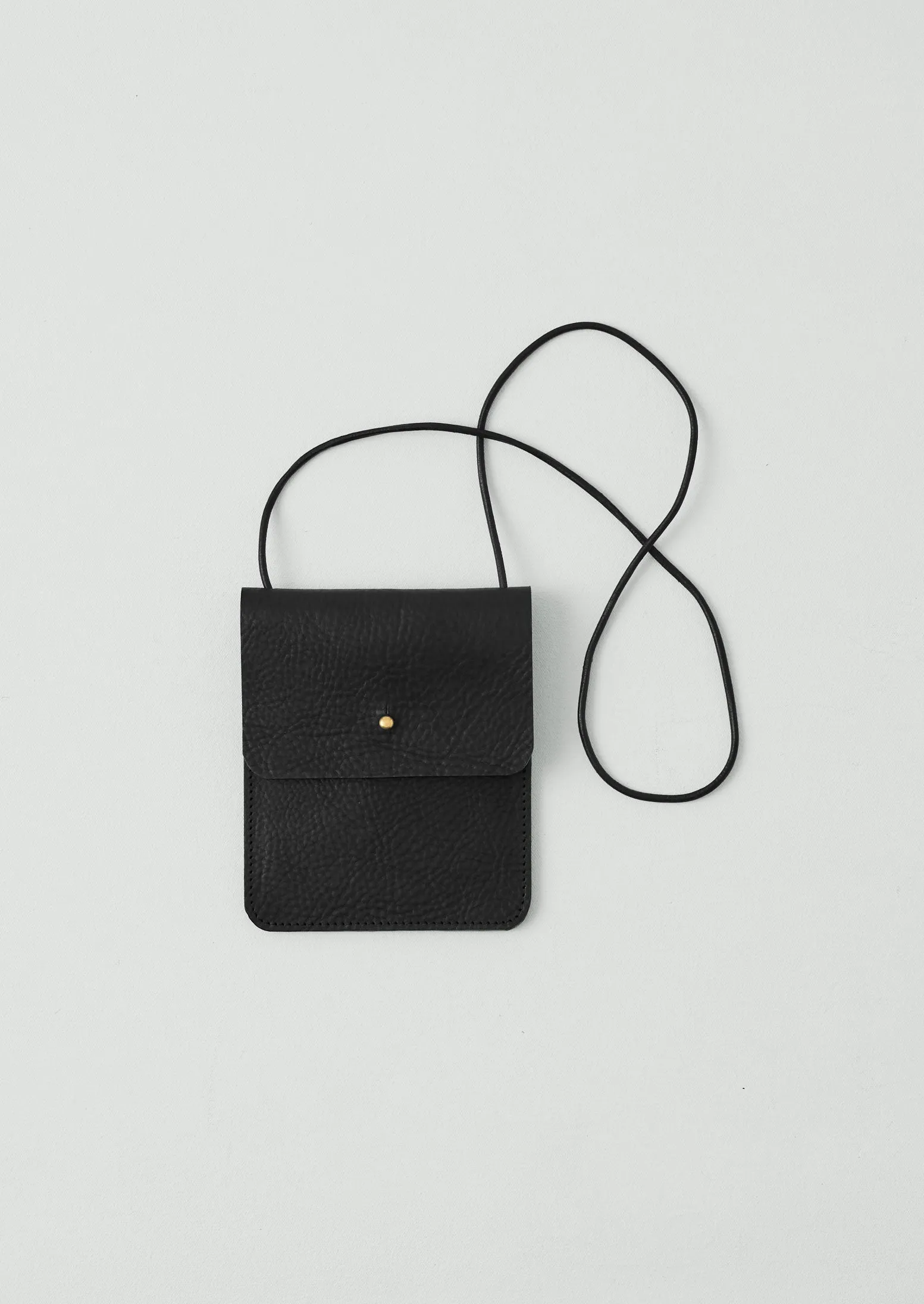 Kate Sheridan Leather Erin Pouch | Black sold by TOAST