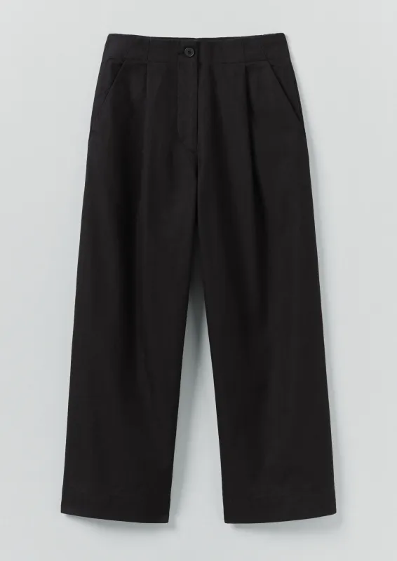 Cotton Wool Herringbone Pleat Front Trousers | Black sold by TOAST