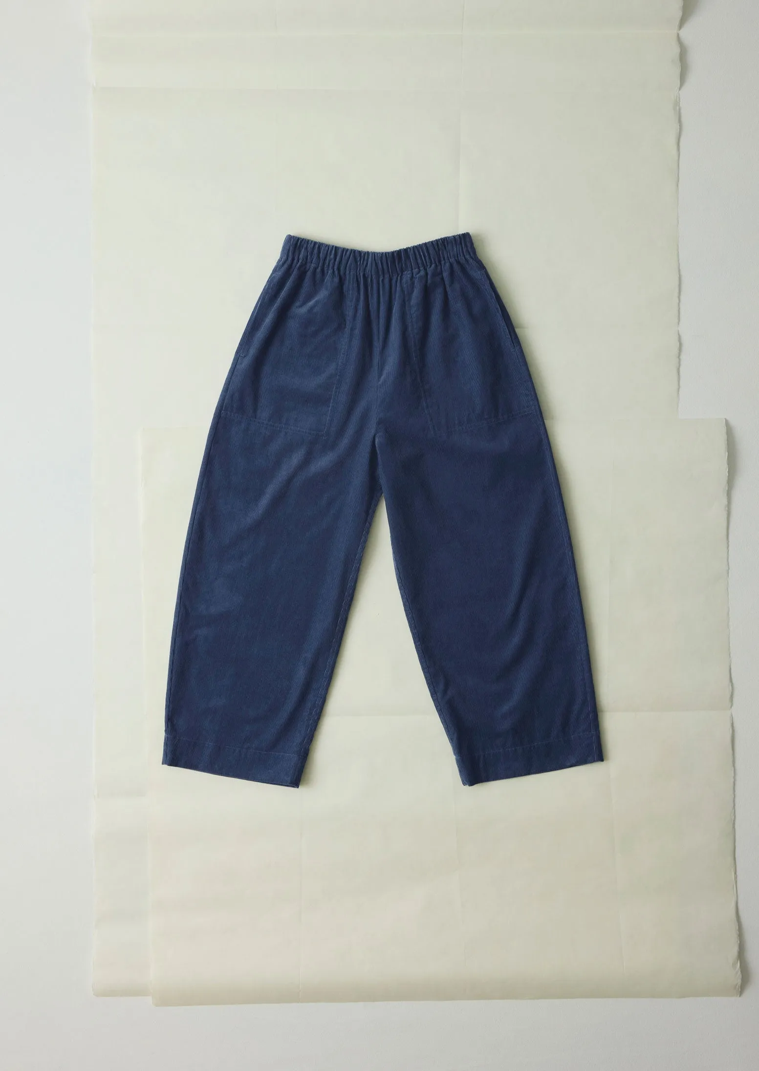 Organic Cord Barrel Leg Trousers | Denim Blue sold by TOAST