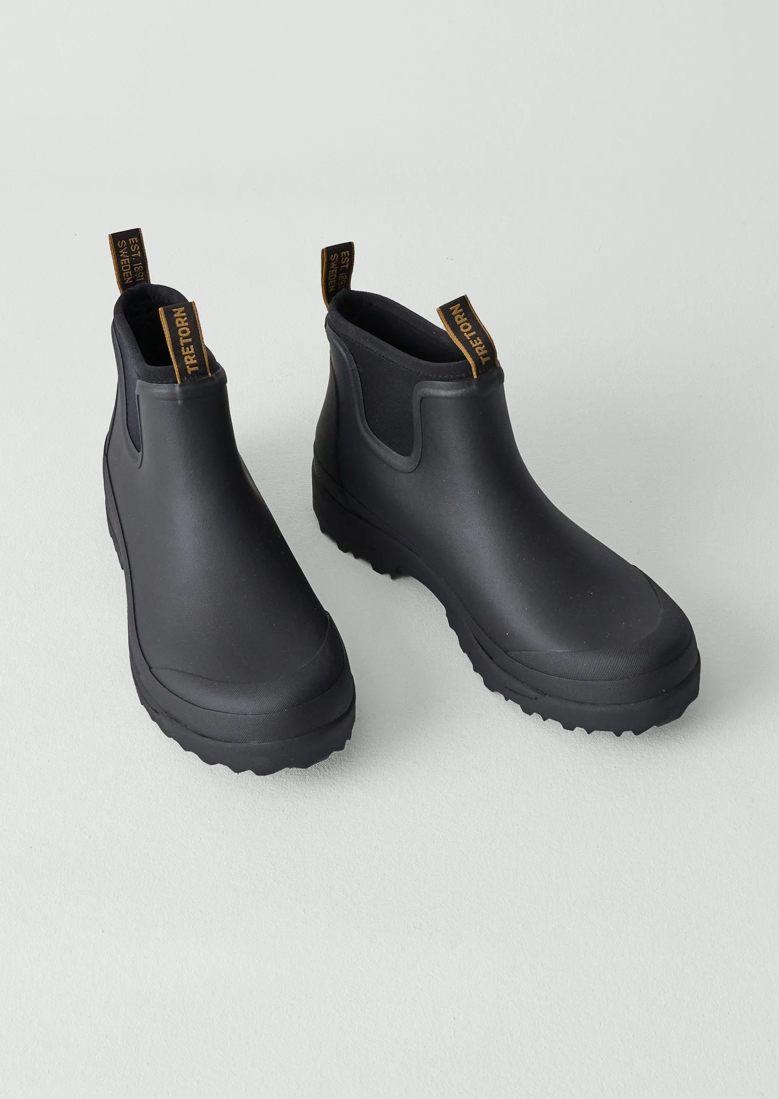 Tretorn Low Neo Boots | Black sold by TOAST