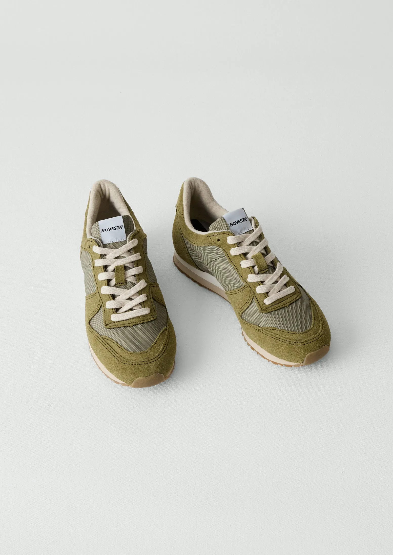 Novesta Marathon Trail Trainers | Bronze Green sold by TOAST