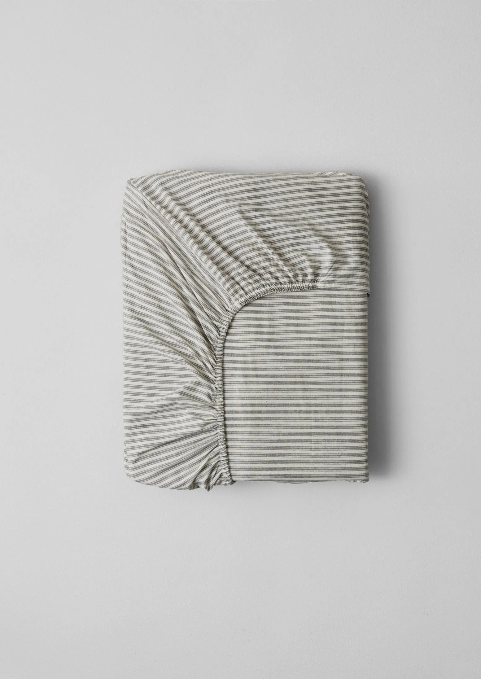Organic Cotton Ticking Stripe Fitted Sheet | Ecru/Graphite sold by TOAST