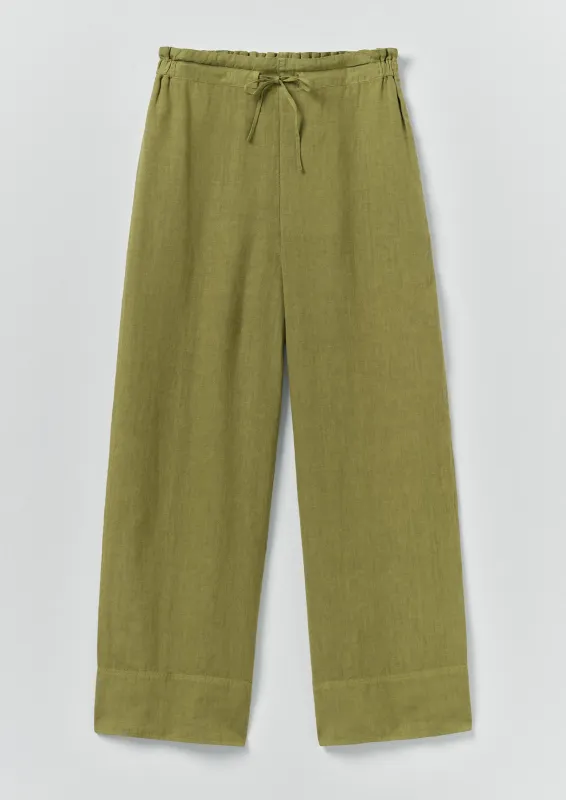 Garment Dyed Linen Wide Leg Trousers | Pale Olive made by TOAST
